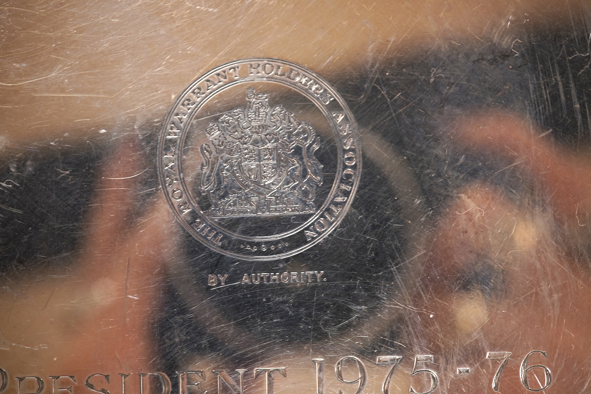 An Elizabeth II silver salver by Garrard & Co Ltd, London, 1975, with engraved inscription, diameter 20.2cm, 10.8oz.